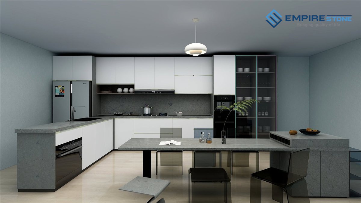 Mẫu bếp chữ L đá thạch anh: Cách chọn màu, chia tấm và xử lý mối nối góc Phối cảnh bếp chữ L mặt đá xám nối liền bàn ăn, tủ trên trắng