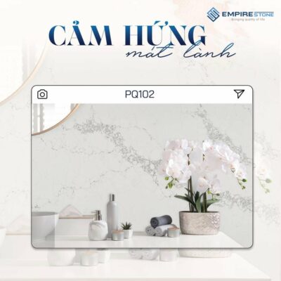 Mặt bàn đá PQ102 nền trắng vân mây xám cạnh bình lan hồ điệp và phụ kiện phòng tắm